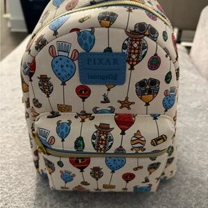 Disney Pixar Loungefly Cream Backpack with Whimsical Hot Air Balloon Print
